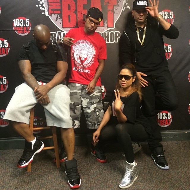 DJ Envy wearing Air Jordan XI 11 Low Infrared 23; Charlamagne wearing Air Jordan XI 11 Bred