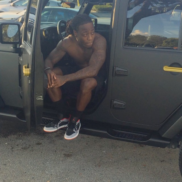 Ace Hood wearing Air Jordan I 1 Low