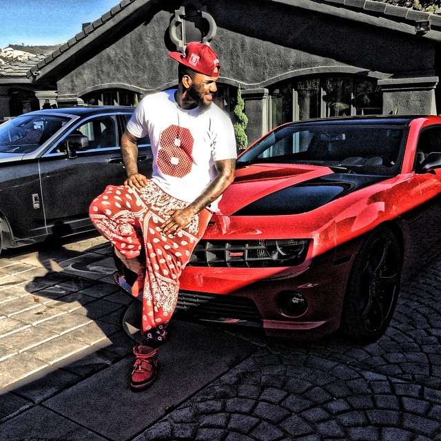 The Game wearing Nike Air Yeezy II 2 Red October