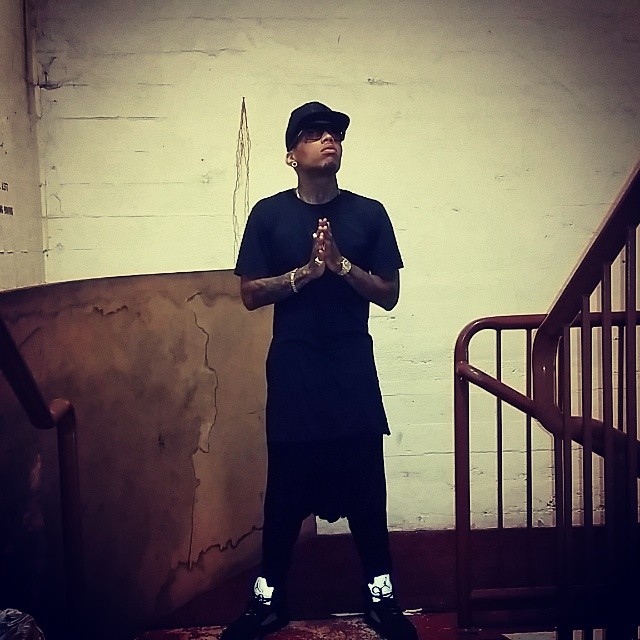 Kid Ink wearing Air Jordan V 5 Metallic