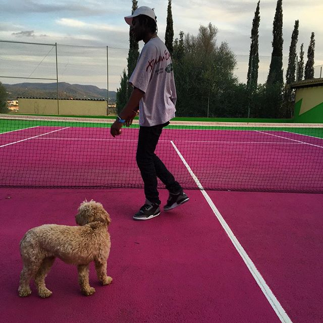 Theophilus London wearing the 'Black Cement' Air Jordan 3