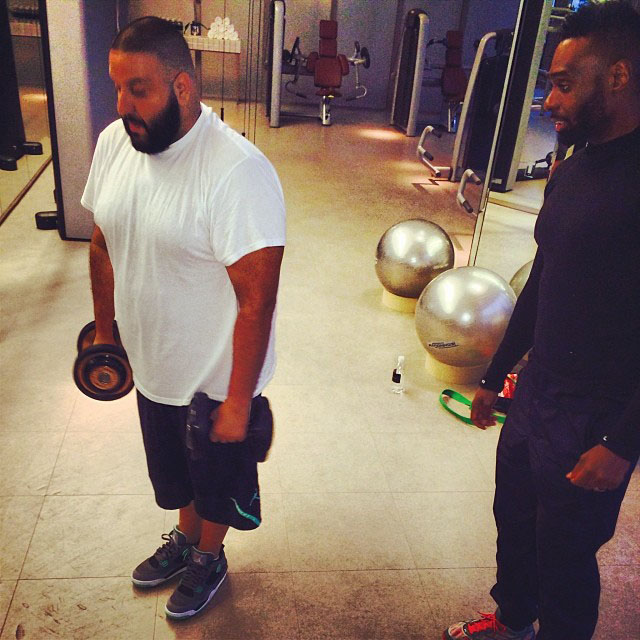 DJ Khaled wearing Air Jordan 4 Retro Green Glow