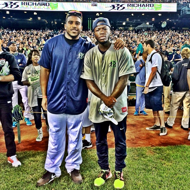 Nate Robinson wearing Nike Roshe Run Mercurial