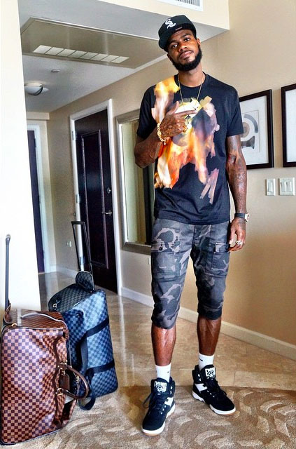 Earl Clark wearing Ewing 33 Hi Black/Gum