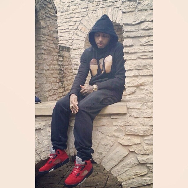 Kid Ink wearing Air Jordan 5 Retro Toro