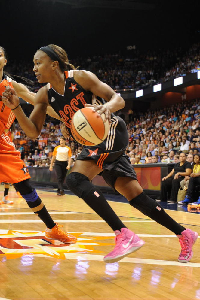 Tamika Catchings wearing Nike Zoom Hyperdisruptor Pink