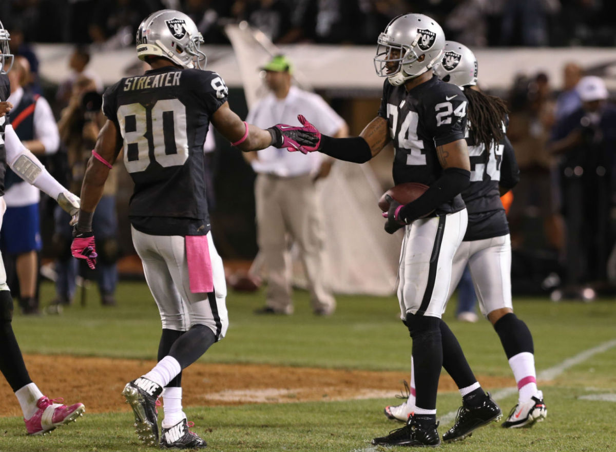 Charles Woodson Wears Air Jordan 12 XII Low Oakland Raiders PE Cleats (5)