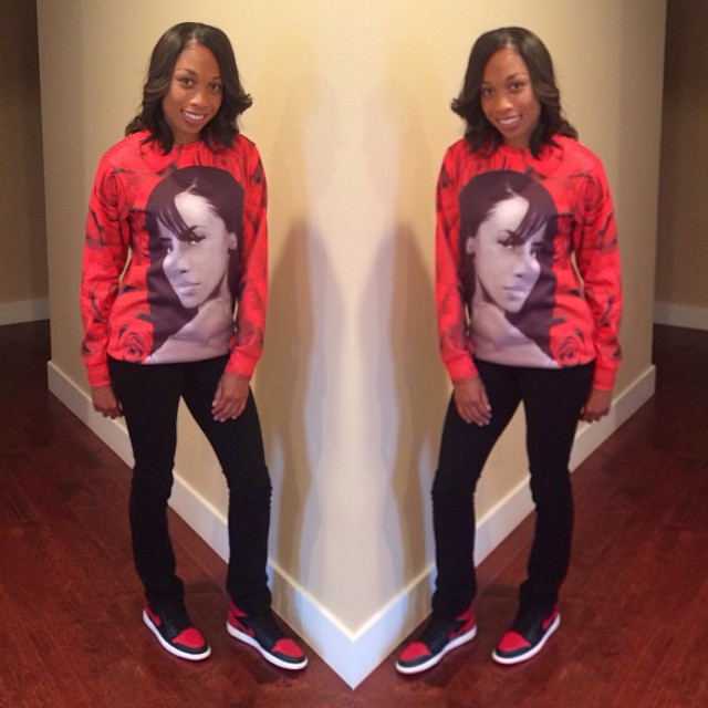 Allyson Felix wearing Air Jordan I 1 Retro Black/Red