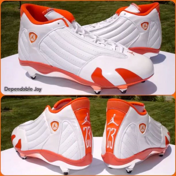 orange jordan cleats