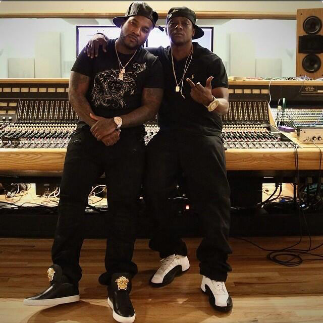 Jeezy wearing Versace High-Top Sneakers; Boosie wearing Air Jordan 12 Taxi