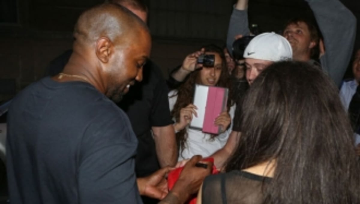 kanye west wearing red octobers