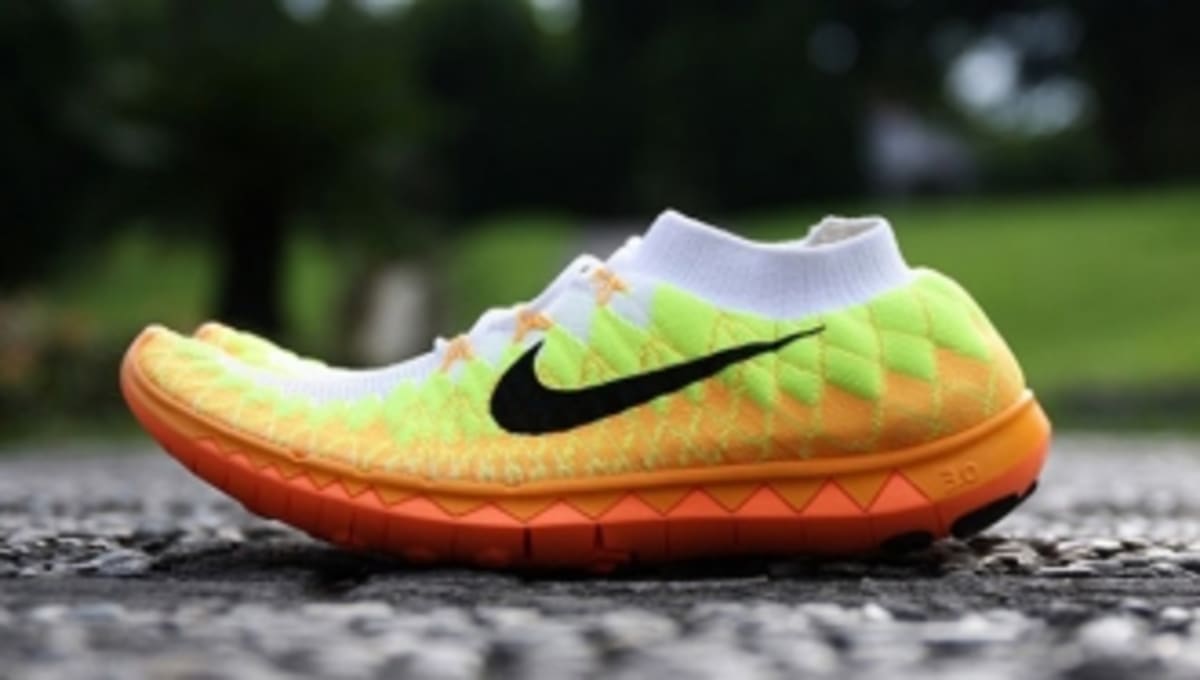 nike flex stride orange