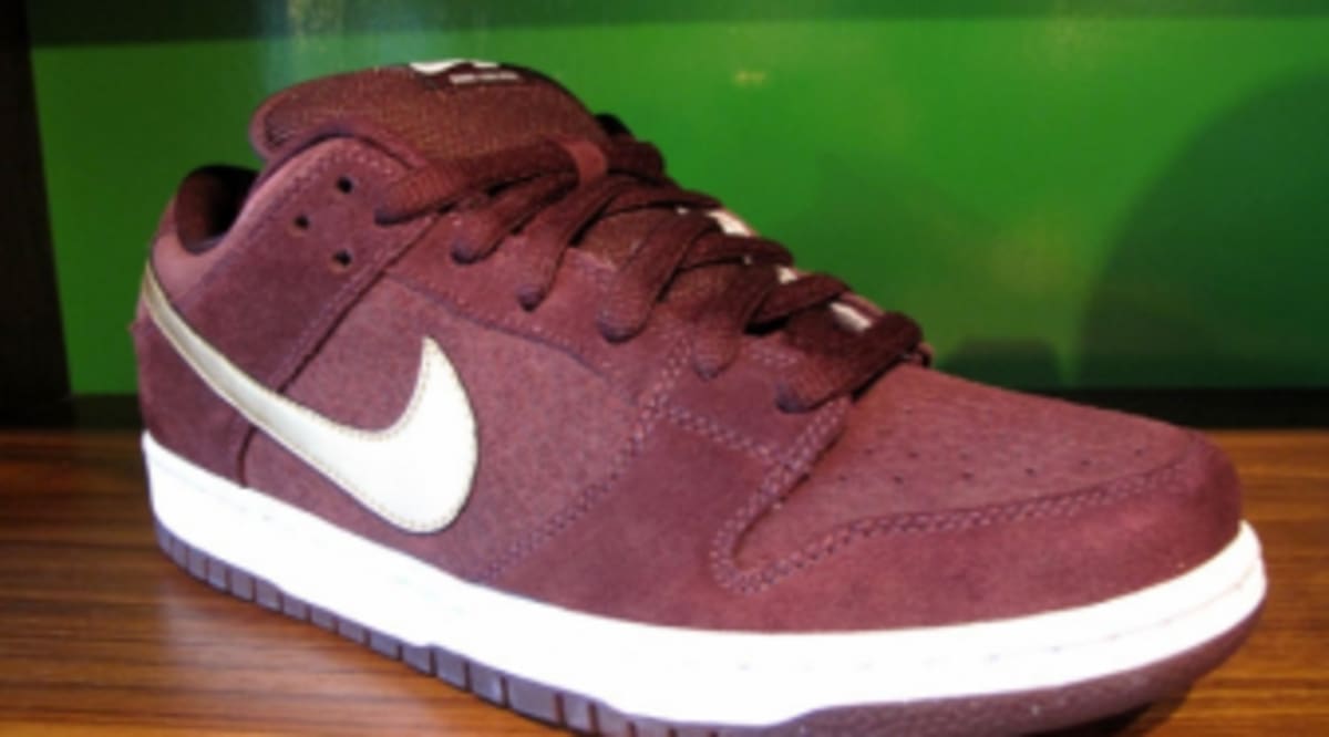 burgundy and gold nike shoes