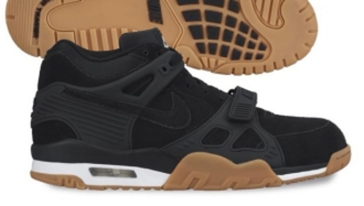black trainers with brown soles