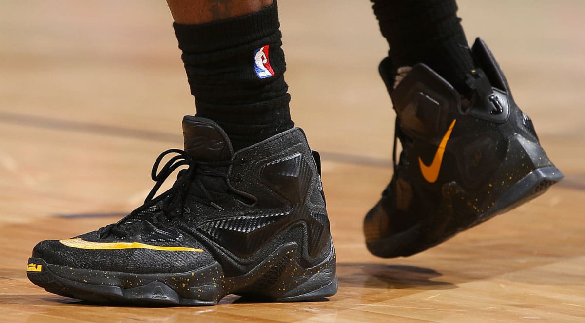 LeBron James Wearing a Black/Yellow Nike LeBron 13 PE ...