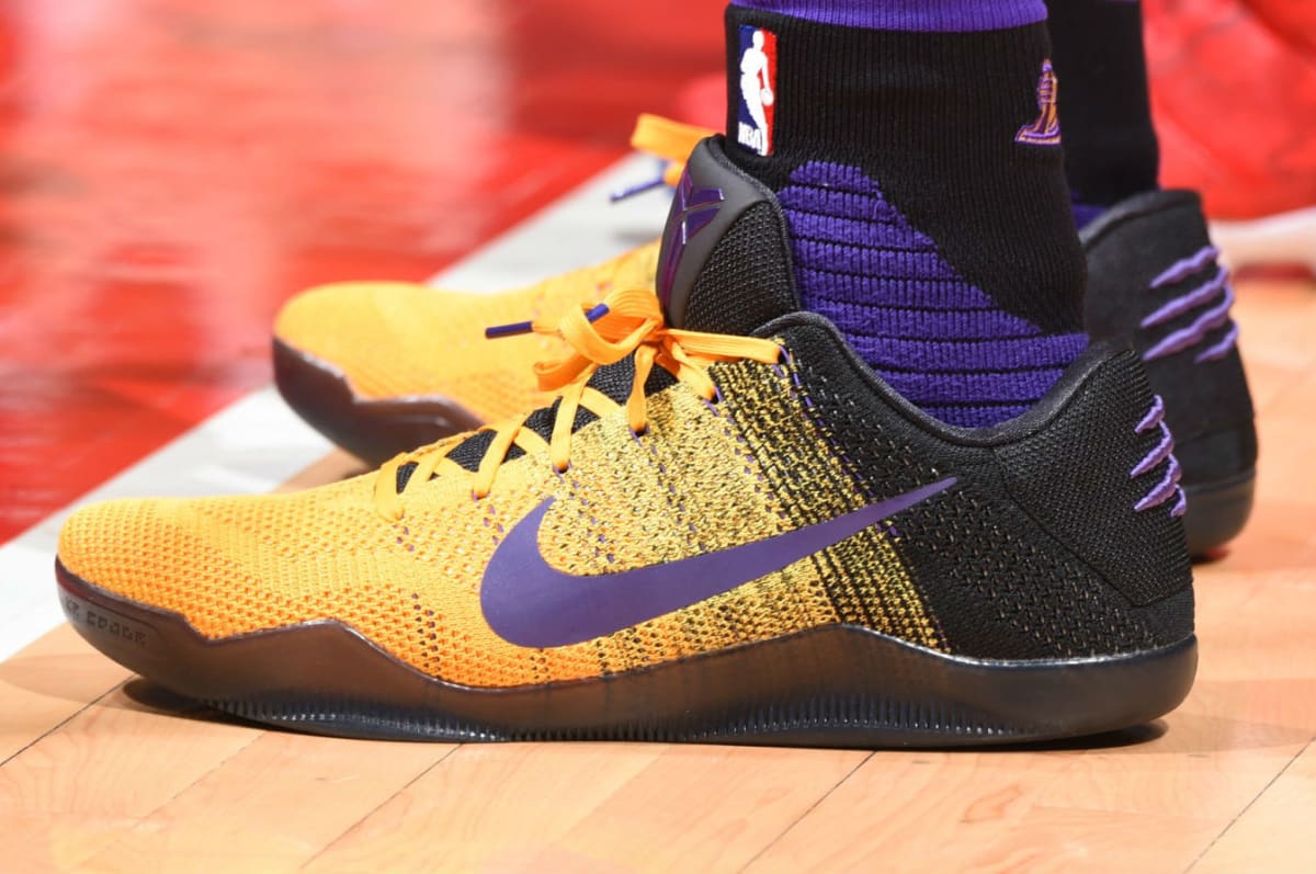 kobe bryant shoes purple yellow