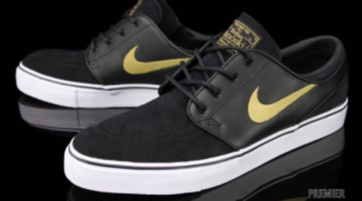nike toki low men's