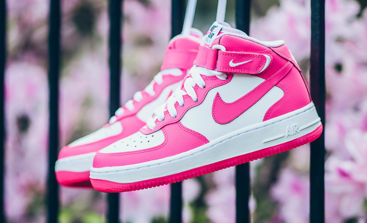 white and pink nike air force ones