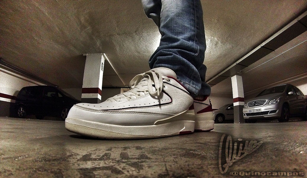 Quino in the White/Red Air Jordan II 2 Retro Low