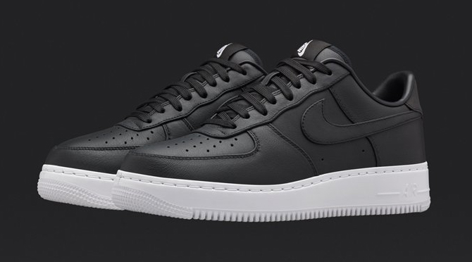 black air force ones with white bottom