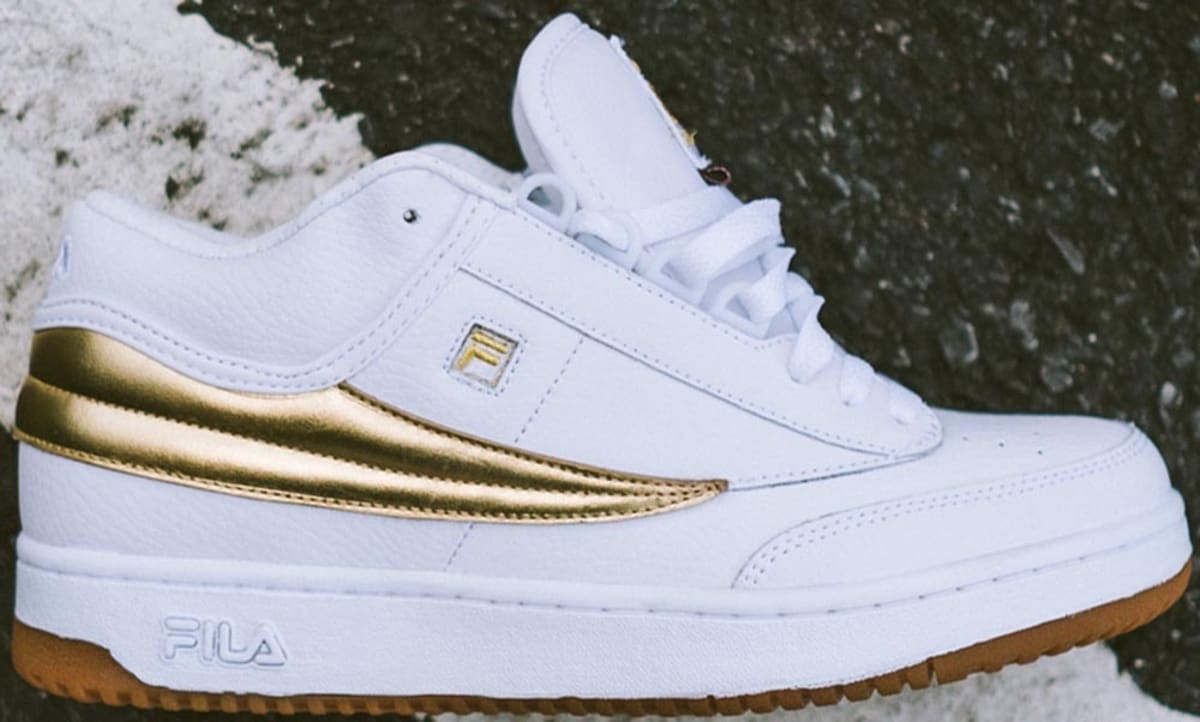 gold and white filas