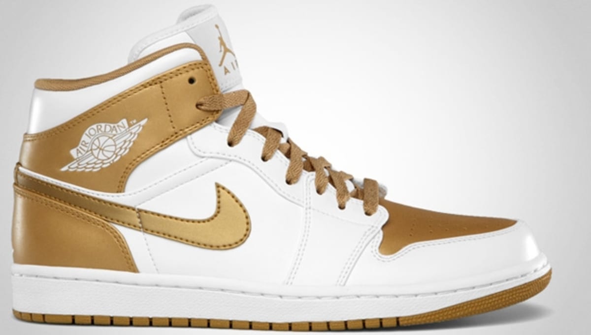gold and white air jordans