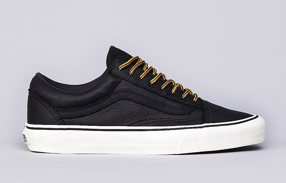 all black vans with white sole