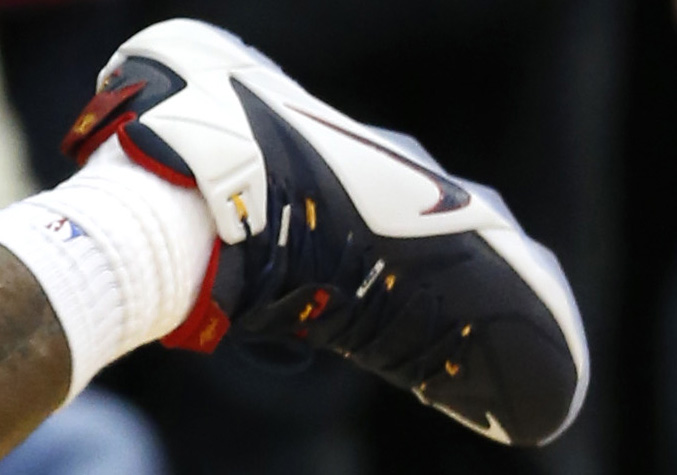 LeBron James wearing Nike LeBron 12 Navy/White-Red-Yellow PE (5)