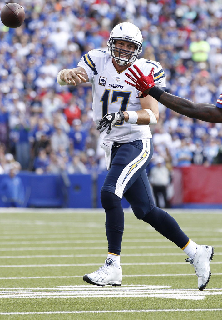 Philip Rivers wearing Reebok Turf Shoes