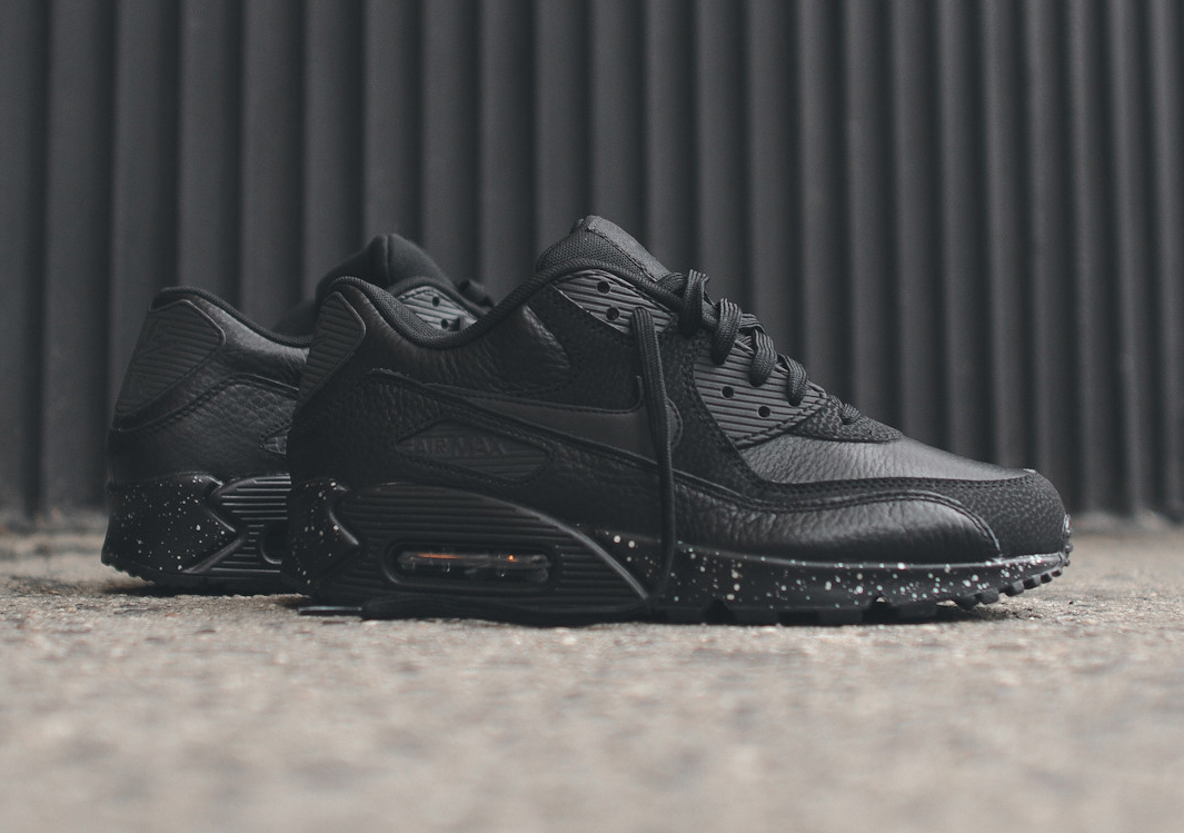Blackout Nike Air Max 90s with a 