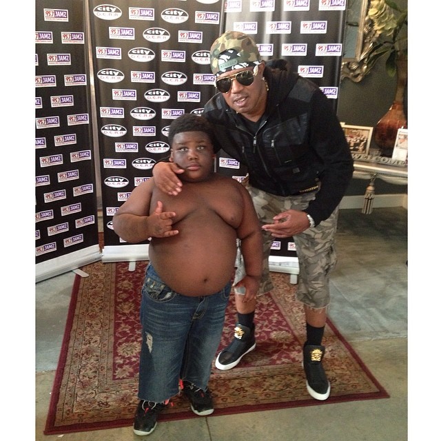 TerRio wearing Nike Air Foamposite Pro Yeezy; Master P wearing Versace Medusa High-Top