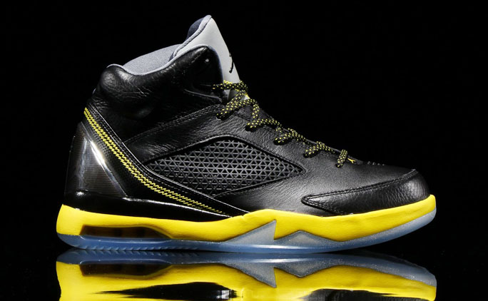 black and yellow flight jordans