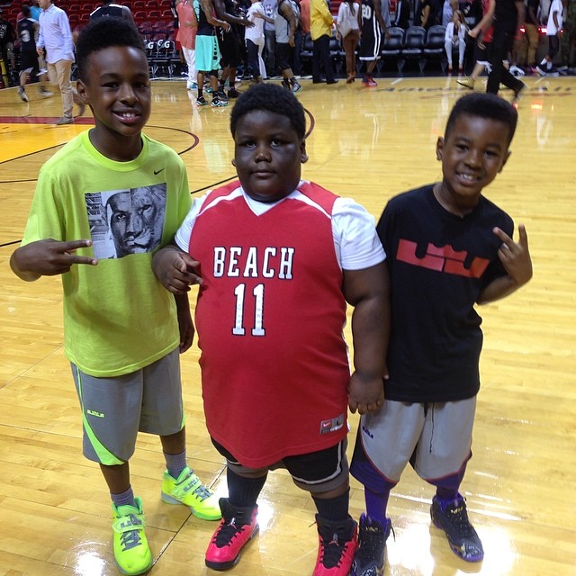 TerRio wearing Air Jordan 6 Retro Infrared23; Bronny wearing Nike Zoom Soldier VII Volt; Bryce wearing Nike LeBron 11 BHM