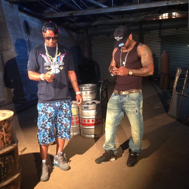 Cam'ron wearing Nike Air Force 180 Green Abyss; Jim Jones wearing Air Jordan VI 6 DMP