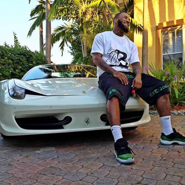 The Game wearing Air Jordan XI 11 Low Green Snakeskin