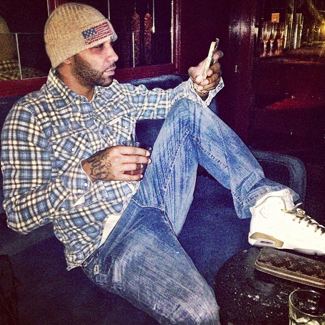 Joe Budden wearing Air Jordan 6 Retro Golden Moments