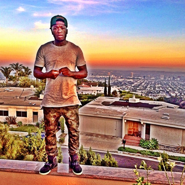 Nate Robinson wearing Nike Air Yeezy 2- Black/Solar Red