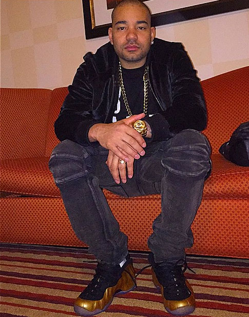 DJ Envy wearing Nike Air Foamposite One Gold