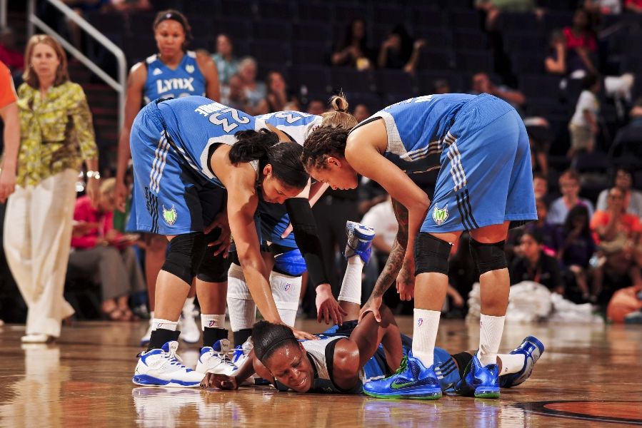 Maya Moore wearing Jordan Fly Wade PE; Seimone Augustus wearing Nike LeBron 9