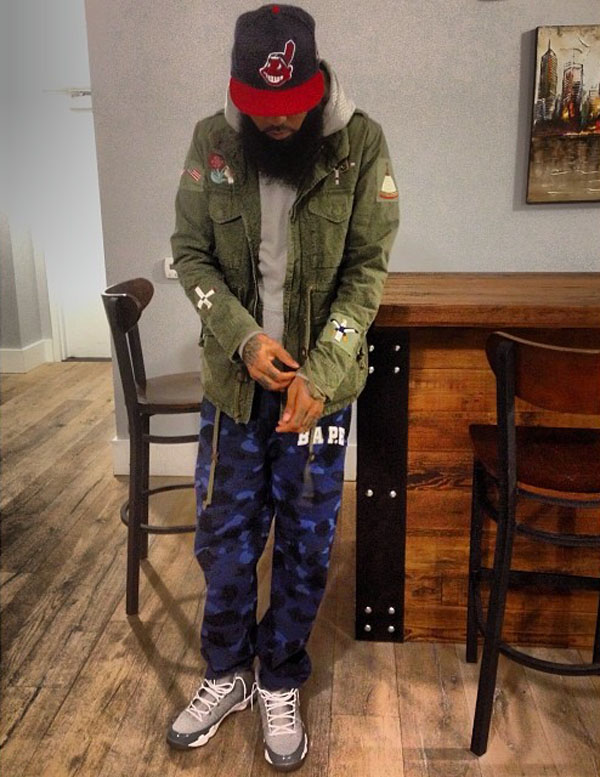 Stalley wearing Air Jordan 9 Retro Cool Grey