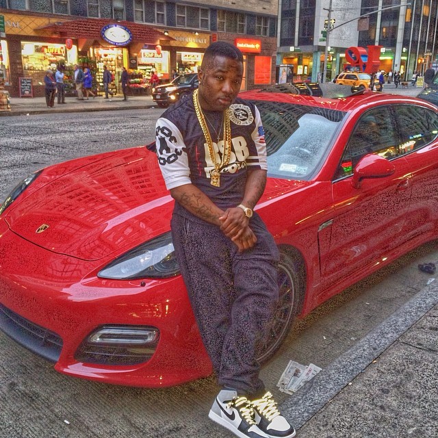 Troy Ave wearing Air Jordan I 1 Barons