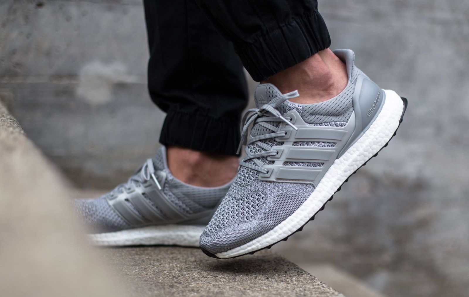 grey ultra boost on feet