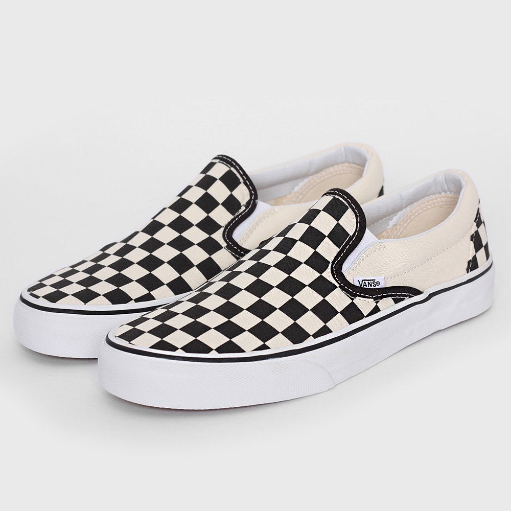 black and white checkered van slip ons