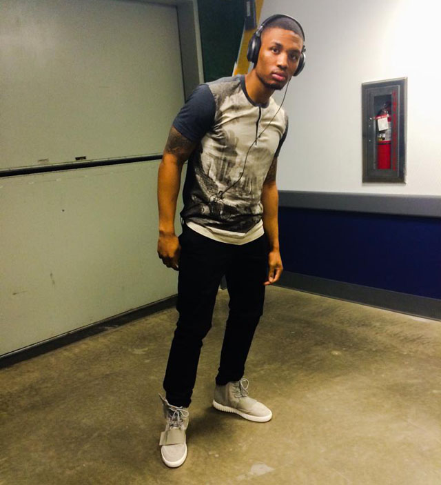 Dame Lillard wearing adidas Yeezy 750 Boost