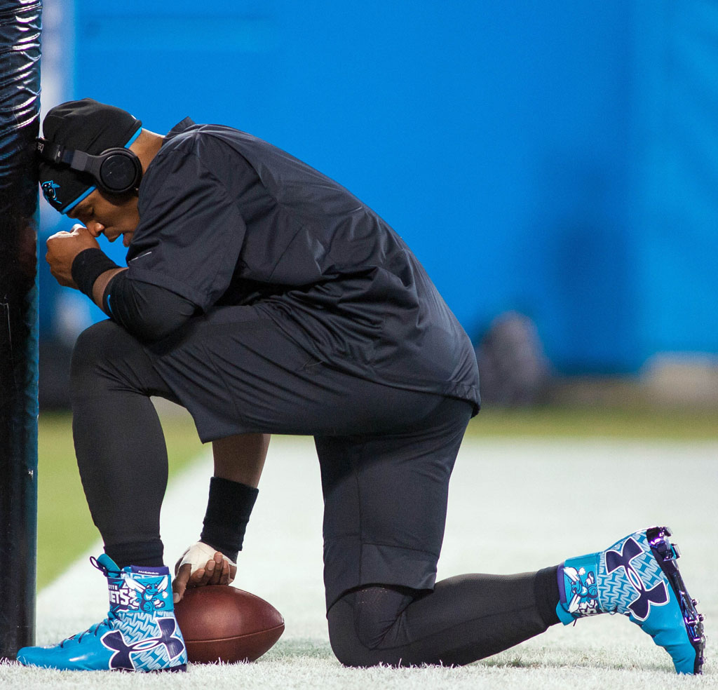 red and blue under armour highlight cleats