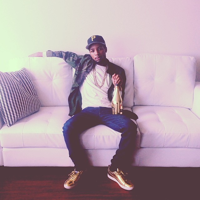 Rockie Fresh wearing UNDFTD x PUMA Clyde Gametime