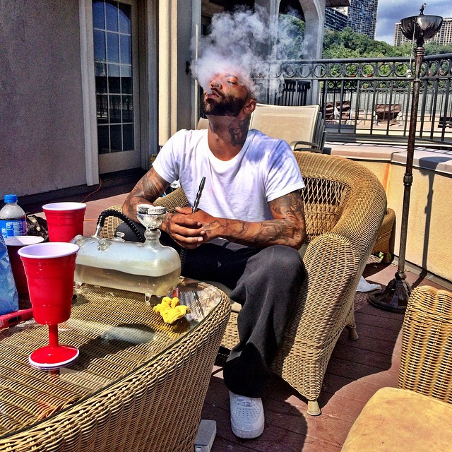 Joe Budden wearing Nike Air Force 1