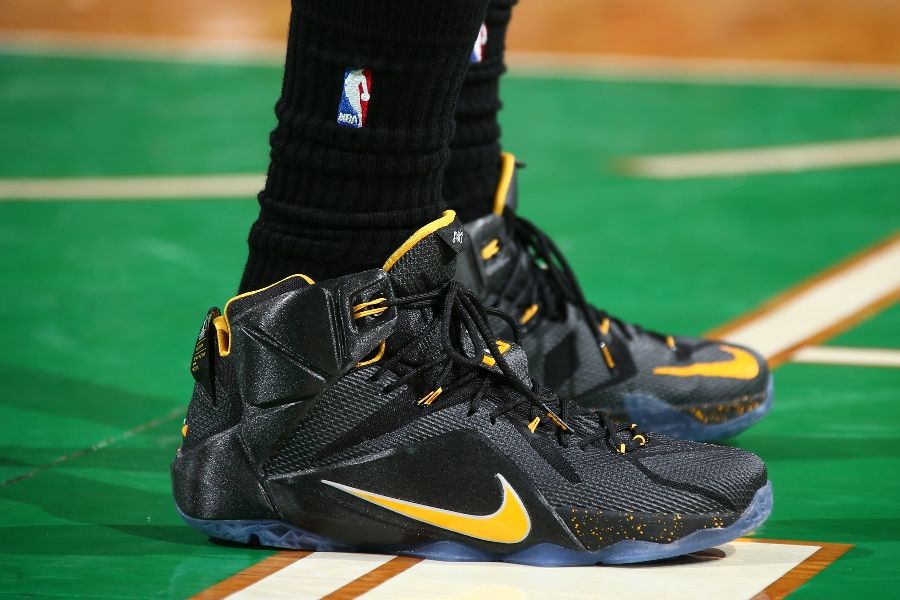 black and yellow lebron shoes