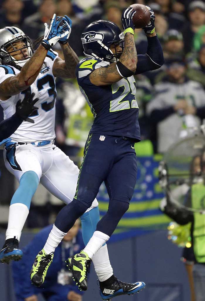 Earl Thomas wearing Air Jordan VII 7 Black/Green PE Cleats (2)