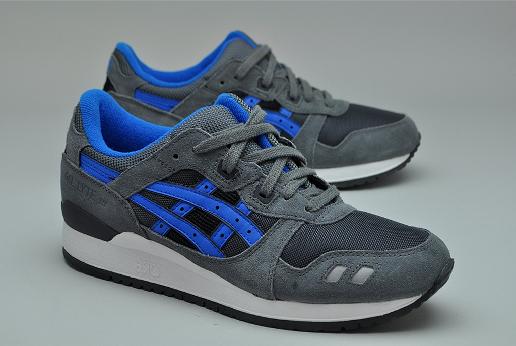 grey and blue asics